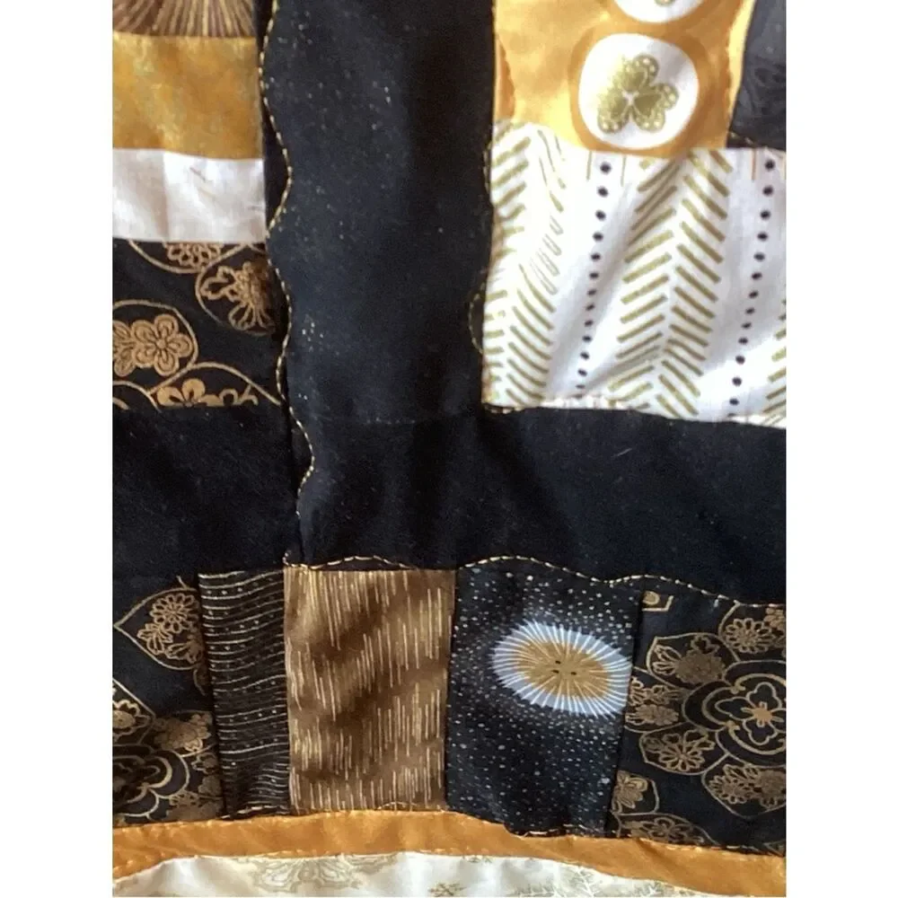 NWT. Gold and Black Star Lap Quilt